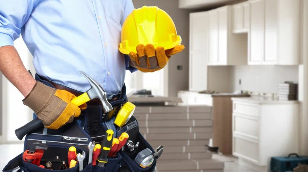 Maintenance technician carrying out repair work with professional tools